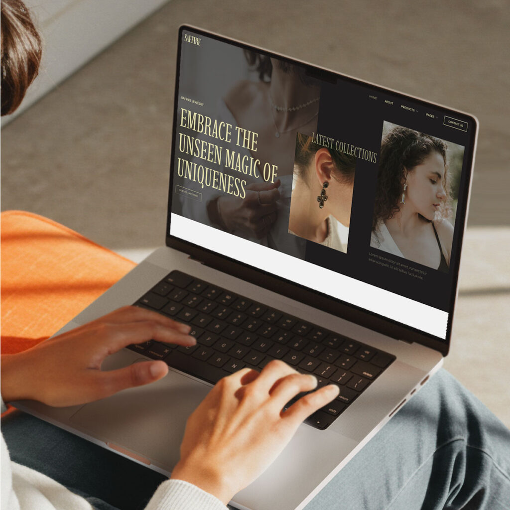 Person using laptop with jewelry website